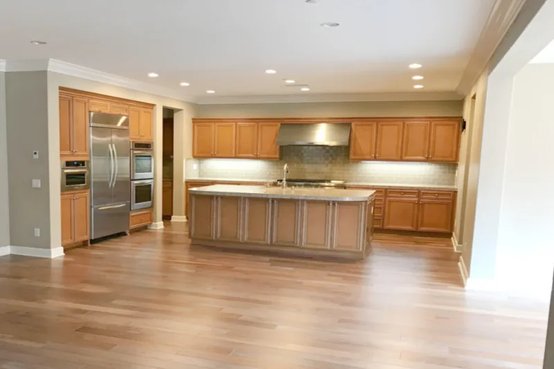 Before view of blue kitchen cabinet transformation