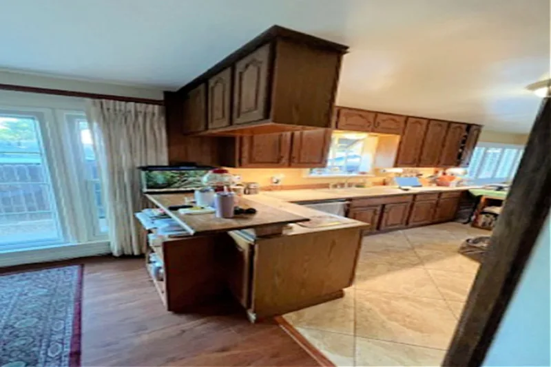 Before view of deep blue kitchen cabinets