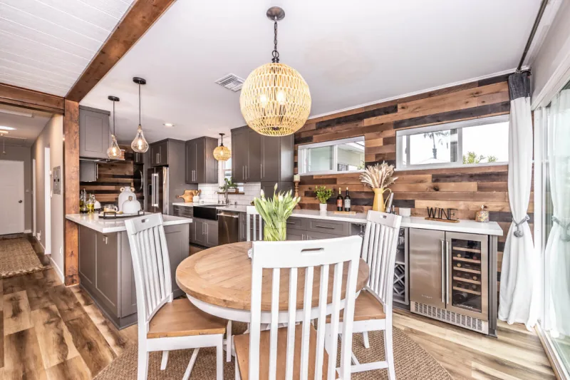 After view of gray cabinets with rustic wood accents
