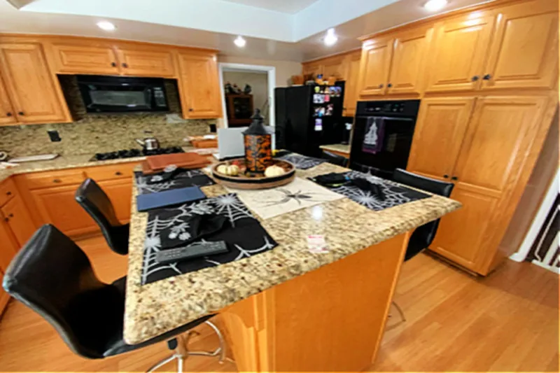 Before view of warm wood shaker kitchen