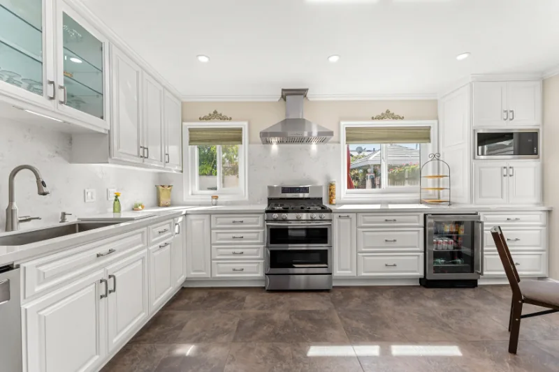 After view of clean white kitchen cabinet makeover