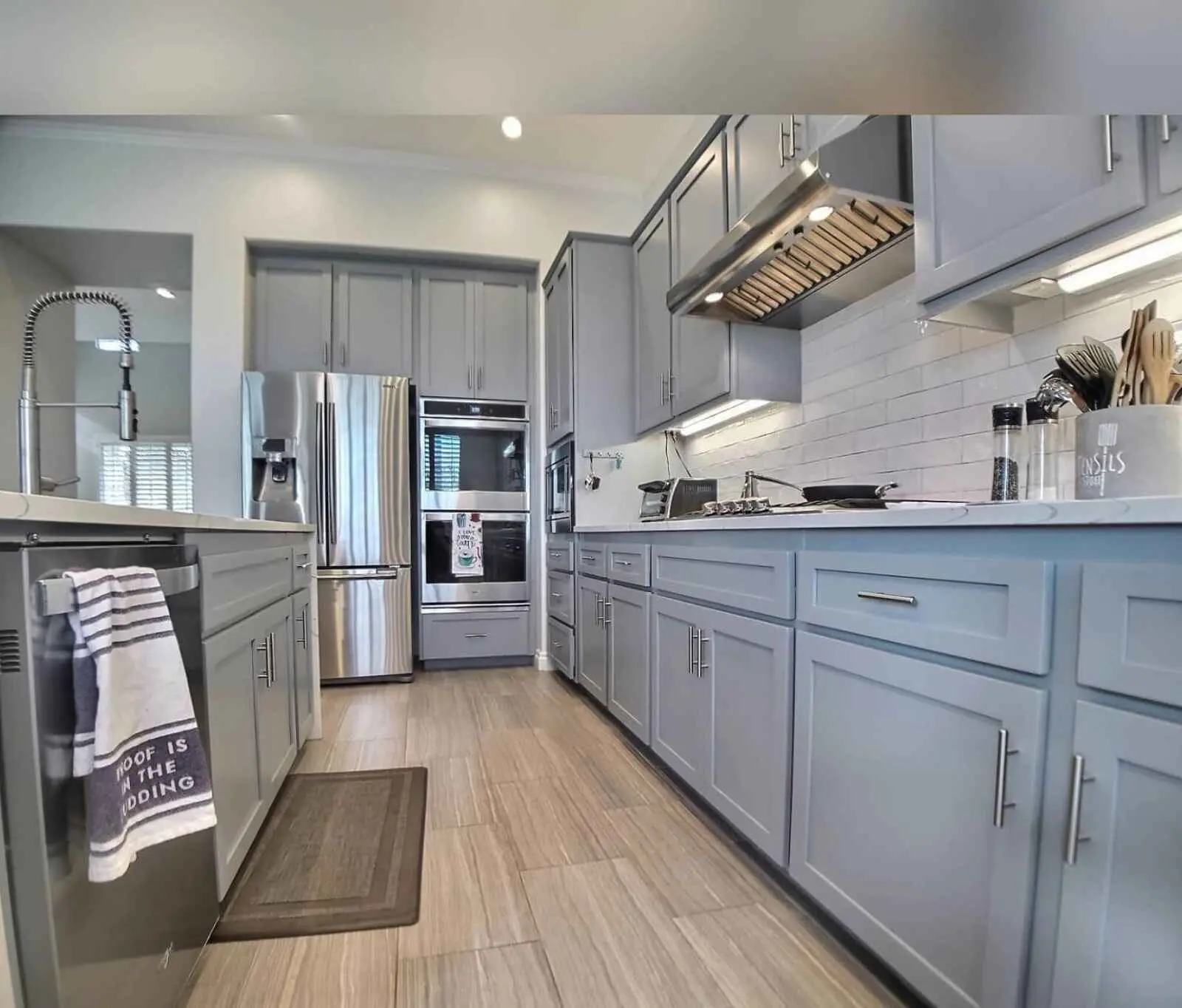 Blue gray kitchen cabinet repainting project