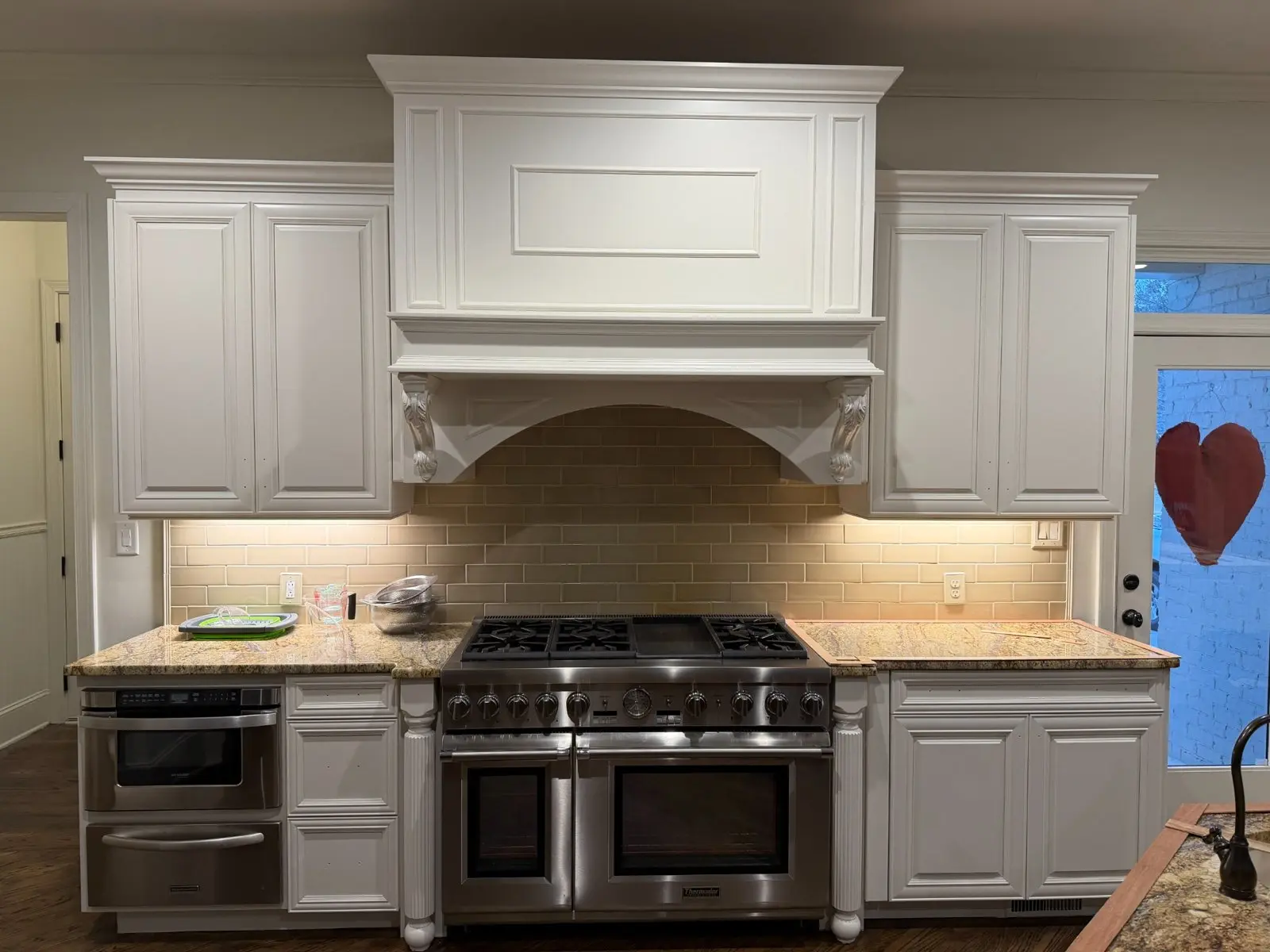 White kitchen cabinets refinished by Urban Fresh Services in Metro Atlanta