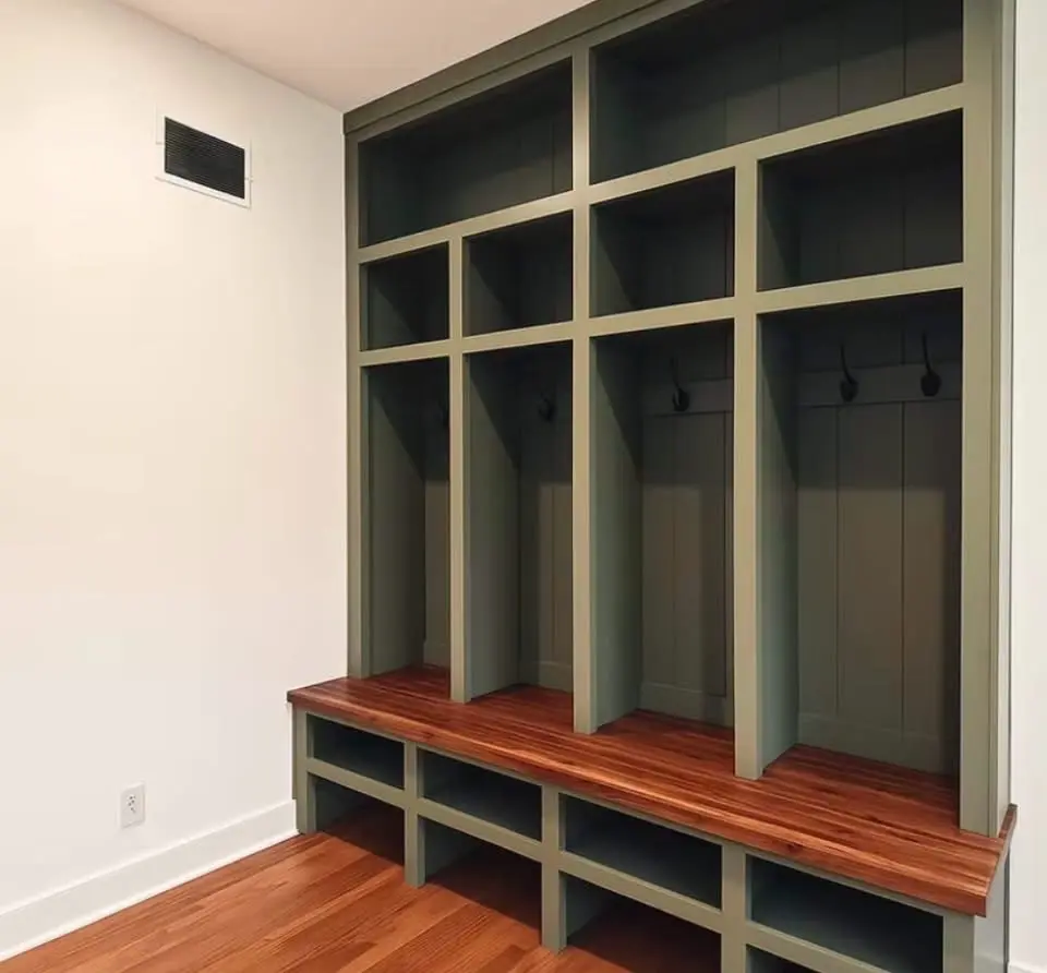 Green mudroom locker cabinetry