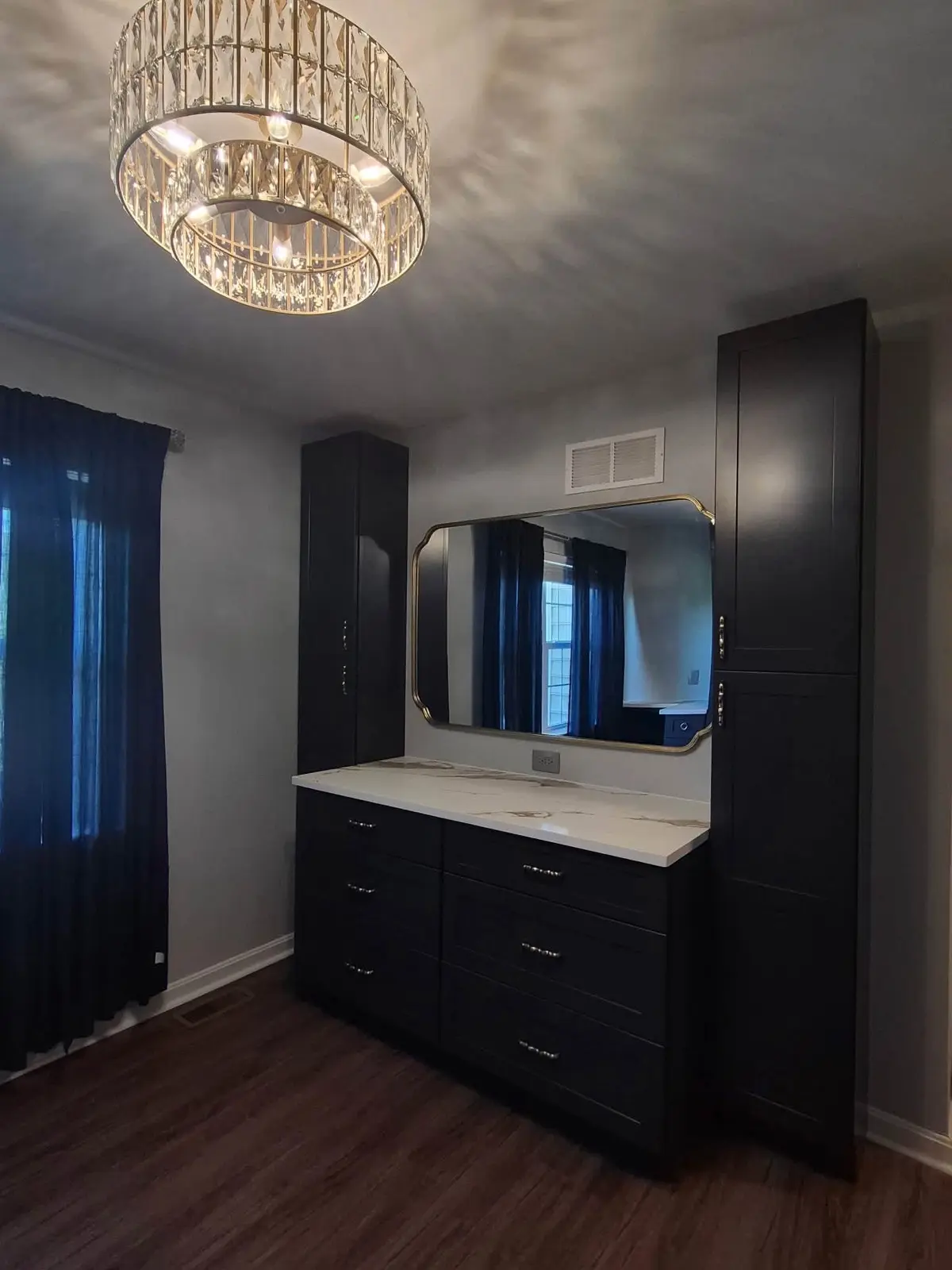 Navy bathroom vanity with doors and drawers